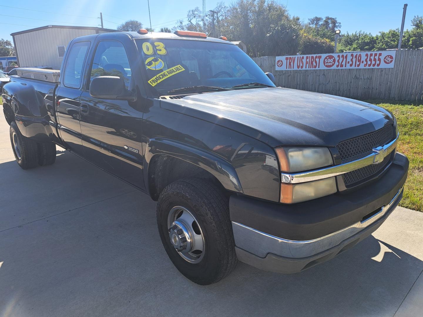 2003 Black Chevrolet Silverado 3500 Ext. Cab 2WD (1GCJC39U23E) with an 6.0L V8 OHV 16V engine, Automatic transmission, located at 1181 Aurora Rd, Melbourne, FL, 32935, (321) 241-1100, 28.132914, -80.639175 - Photo#2